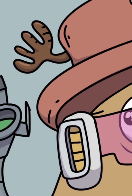 Close-up of a goggled creature reaching out